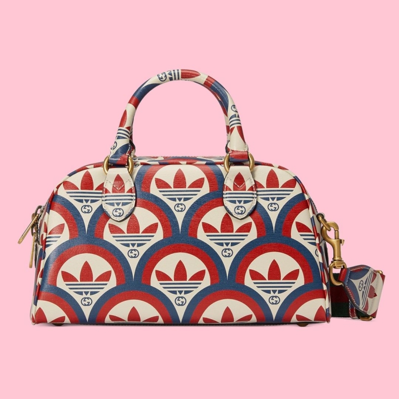 G*u*i top handle bags